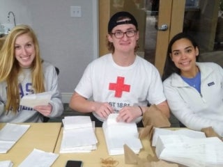 Students preparing napkins