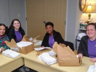 Students preparing napkins