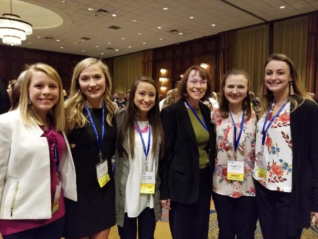 Honors students attending a nursing conference with Dr. Patricia Grady.