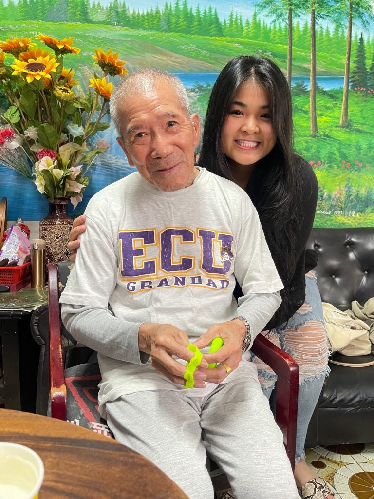 Nursing student Bonnie Chen with her grandfather in Taiwan.
