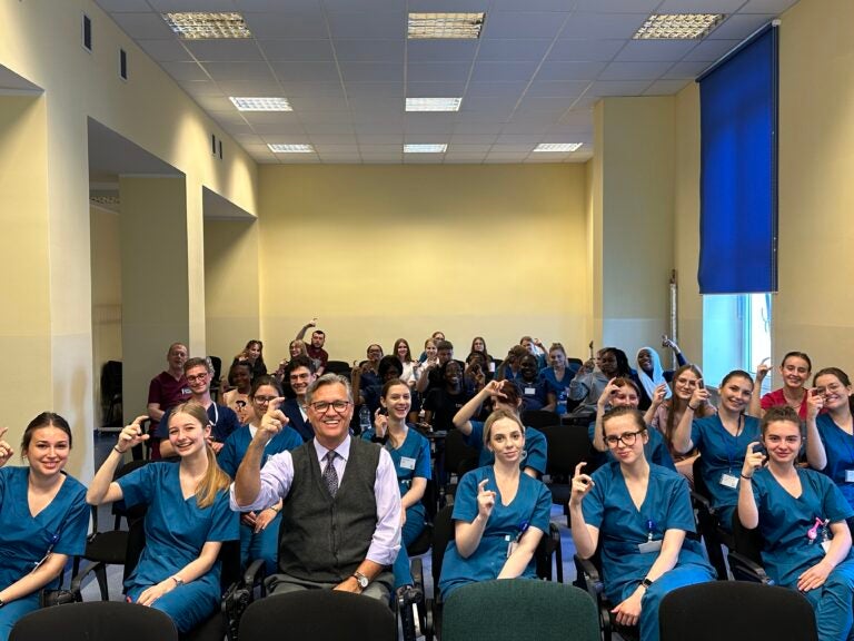 Dr. Hand with Polish nursing students.